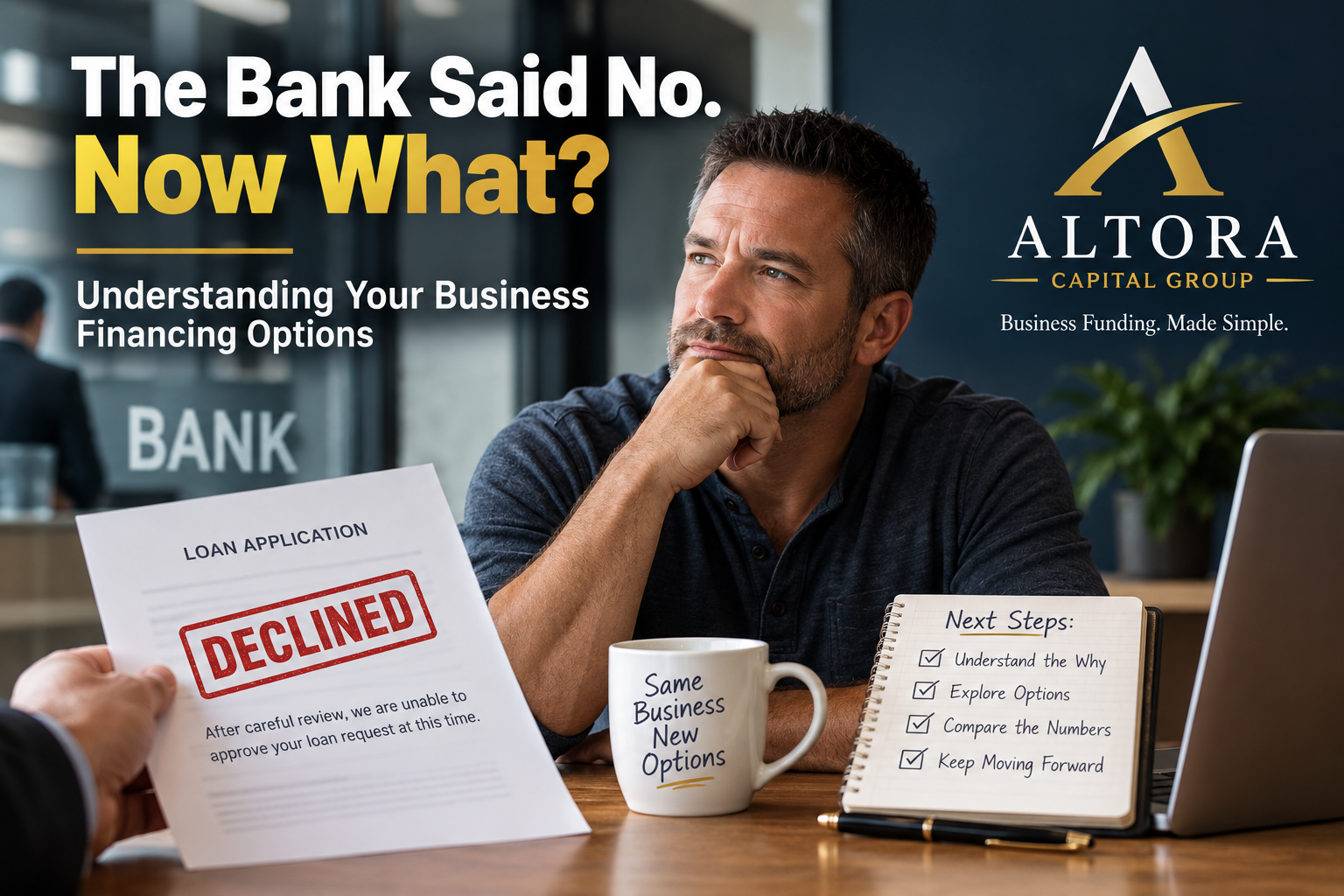 Business owner reviewing financing options after a bank decline